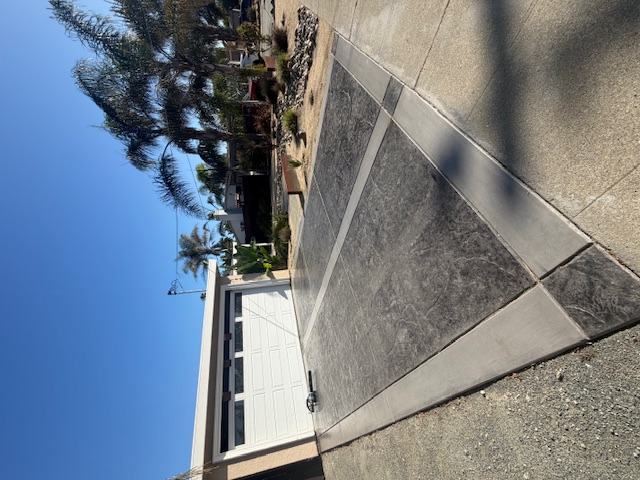 Decorative concrete driveway with contrasting borders in Concord
